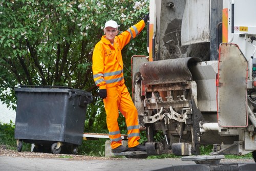 Professional team conducting flat clearance